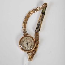 A vintage 9ct gold cased ladies Elco 15-jewel wristwatch with yellow metal bracelet strap.