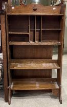 An Arts & Crafts oak open bookcase, 115cm high.