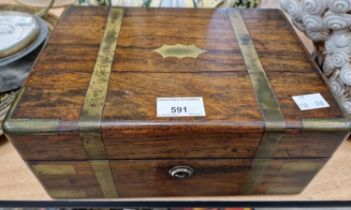 A late 19th century rosewood and brass bound document box, the hinged top with recessed storage