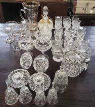 A collection of assorted glassware to include glasses, ice bucket, table bells, liqueur glasses with