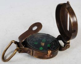 Troughton & Simms, London 1910, a lacquered brass field compass.