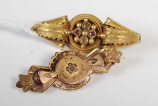 A late 19th century yellow metal and gem set bar brooch with later fixing, together with another