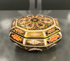 A Royal Crown Derby octagonal shaped dish and cover in the Old Imari pattern, with painted marks '