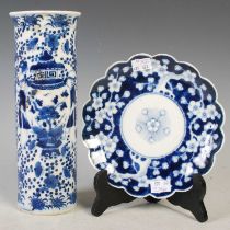 A Chinese porcelain blue and white sleeve vase, Qing Dynasty, decorated with two panels of boys