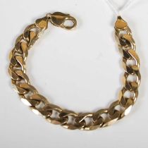 A 9ct gold curb link bracelet, 21cm long, 38.8 grams.