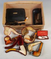 A box of assorted Meerschaum and other tobacco pipes, together with a small collection of cheroot
