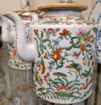 A Chinese porcelain famille rose canton tea kettle and cover, Qing Dynasty, 15.5cm high.