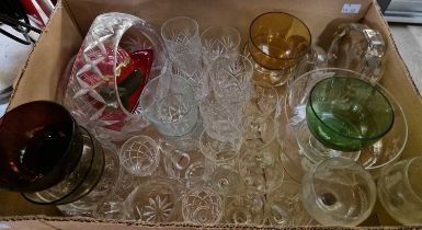 A box of assorted glassware to include glasses, jugs, basket, etc.