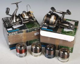 Fishing interest - two boxed Shimano Super Bait Runner 6000 XTEA reels, together with four spare