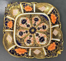 A Royal Crown Derby Old Imari pattern twin handled dish, stamped and painted marks to base 'H8211'