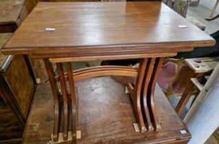 A mid-century teak nest of three tables by G Plan, 52cm high x 55.5cm wide.