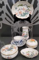 A group of Meissen hand-painted porcelain comprising a circular box and cover, small vase and two