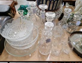 A collection of assorted glassware to include decanters, bowls, glasses, candlesticks etc.