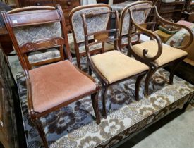 A reproduction mahogany Regency style open armchair, together with a matching side chair, and