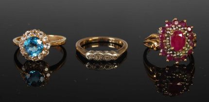 Three assorted dress rings to include a 9ct gold, topaz and diamond cluster ring, ring size 'O',