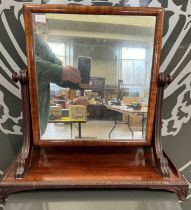A 19th century mahogany dressing table mirror, the square tilt action mirror plate raised on