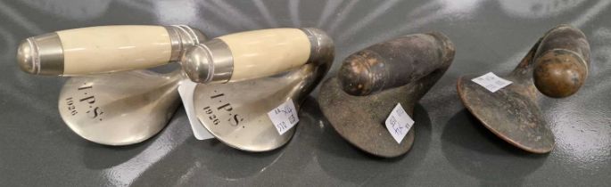 A pair of curling stone handles inscribed 'I.P.S.1926' together with another pair of curling stone