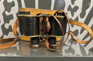 A leather cased set of binoculars by W. Watson & Sons Ltd, London.