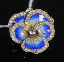 A late Victorian yellow metal, split pearl, white sapphire and enamel brooch in the form of a pansy,