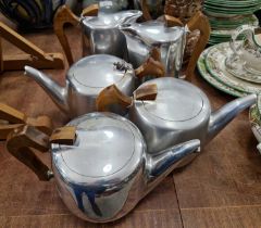 Five pieces of Picquot tea ware comprising three tea pots and two hot water pots.