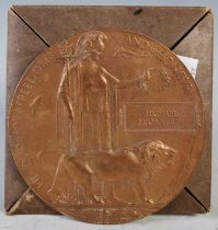 A World War bronze death plaque inscribed 'Michael McCafferty'.