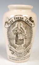 A 19th century stoneware cream pot with black transfer printed detail 'PURE FRESH CREAM,