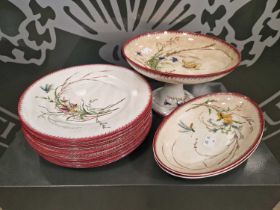 A 19th century Sarreguemines Papillon patterned part fruit set, comprising comport, two oval