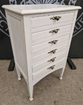 A 20th century white painted sheet music cabinet with six fall front drawers and later handles,