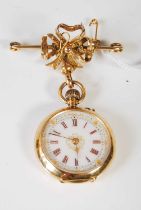 A late 19th / early 20th century yellow metal fob watch, the white, red and black Roman numeral dial