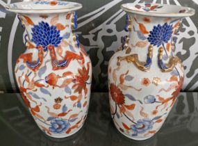 A pair of modern Chinese Imari vases, 36cm high.