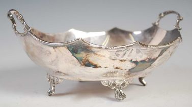 A George V silver twin-handled bowl, Sheffield, 1927, makers mark of H.A, oval-shaped with wavy rim,