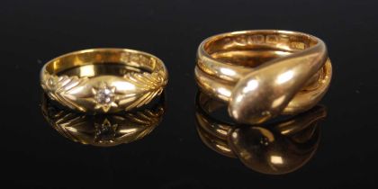 An 18ct gold serpent ring, size 'L/M', 9.1 grams, together an 18ct gold and diamond single stone