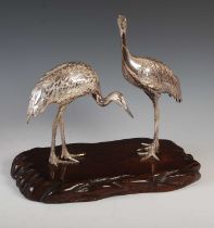 A late 19th / early 20th century Japanese white metal figure group of two Manchurian Cranes, mounted