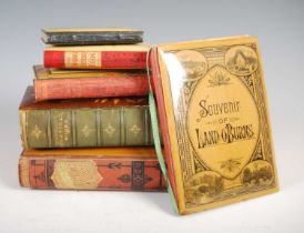 A collection of six Mauchline Ware bound books, to include 'Souvenir of Land O' Burns' 17cm; '