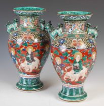 A pair of Japanese Kutani porcelain vases, late 19th / early 20th century, decorated with Lohan