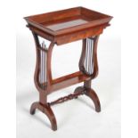 A Dutch Empire mahogany tray-top side table, the rectangular top with raised gallery edge above a