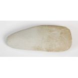 A Neolithic polished stone hand axe, 11.5cm long.