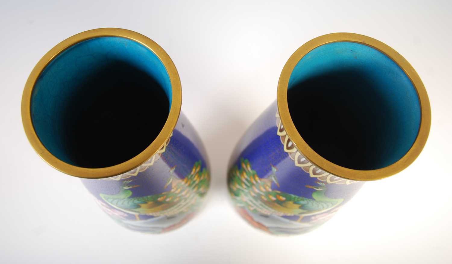 A pair of Chinese blue ground cloisonne vases, late 19th / early 20th century, decorated with a pair - Image 5 of 6