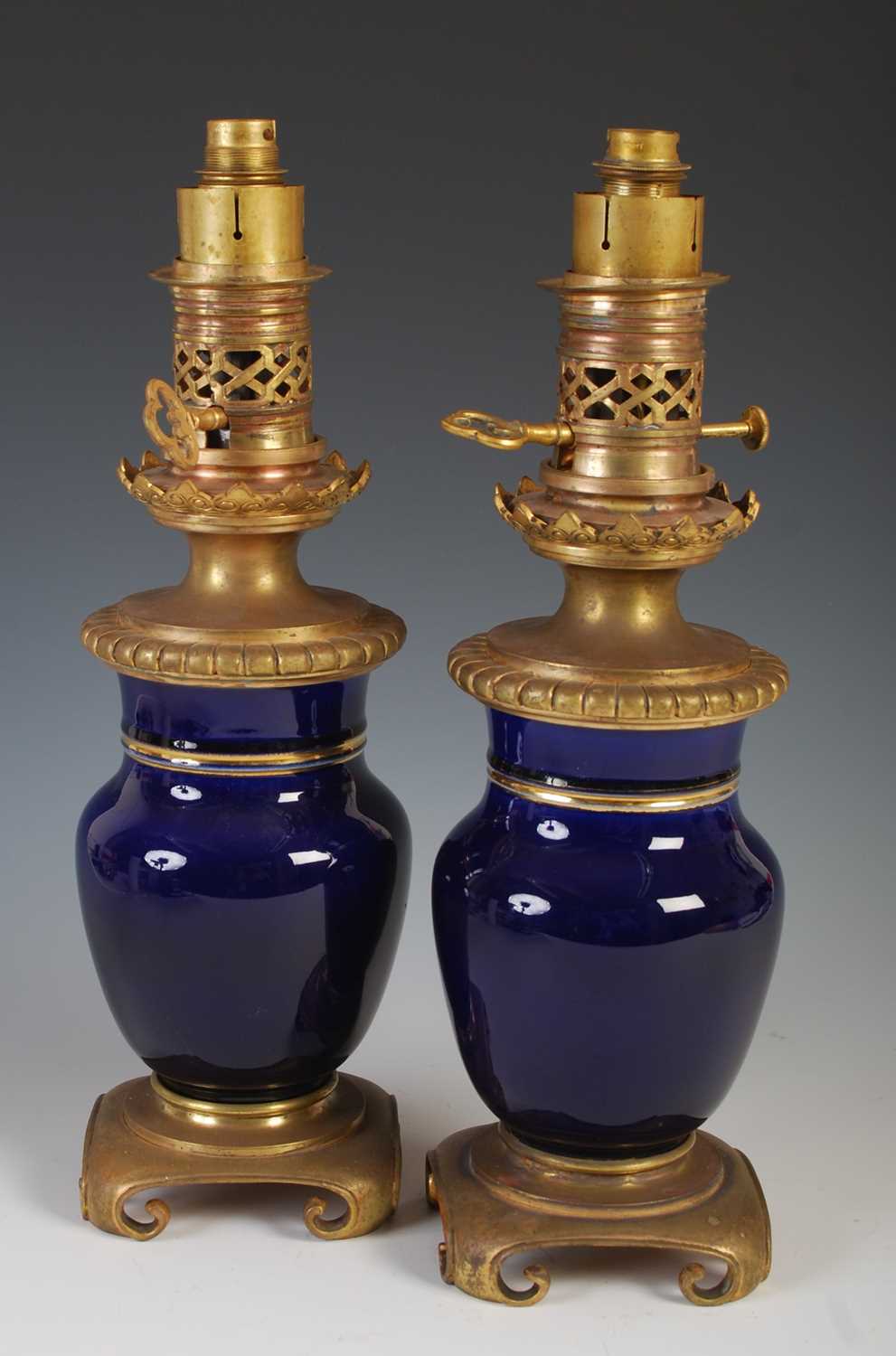 A pair of gilt metal mounted blue pottery table lamps, formally oil burning paraffin lamps, 39cm - Image 2 of 7