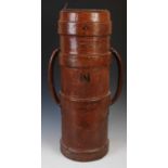 A late 19th / early 20th century Military leather two-handled shell case / stick stand, impressed '