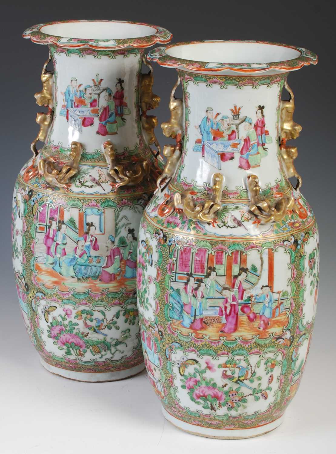 A pair of Chinese porcelain famille rose canton vases, Qing Dynasty, decorated with rectangular