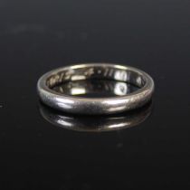 A platinum wedding ring, of plain circular form, size 'I', 3 grams.
