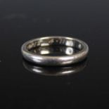 A platinum wedding ring, of plain circular form, size 'I', 3 grams.