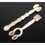 Two unusual Scottish bone double snuff spoons; one with carved and part-reeded baluster stem; the