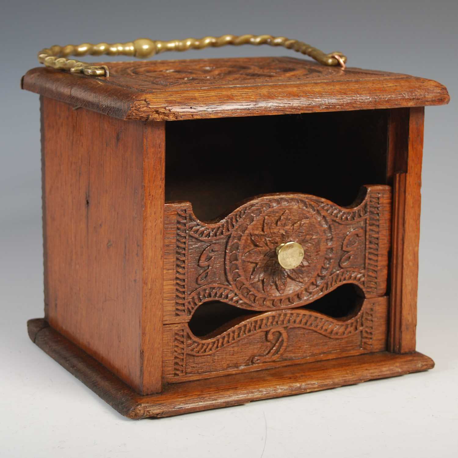 An early 19th century Dutch, Friesland, foot warmer, of rectangular form with top carved and pierced