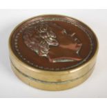 Sir Walter Scott Interest - A copper and brass circular snuff box, the pull-off cover embossed