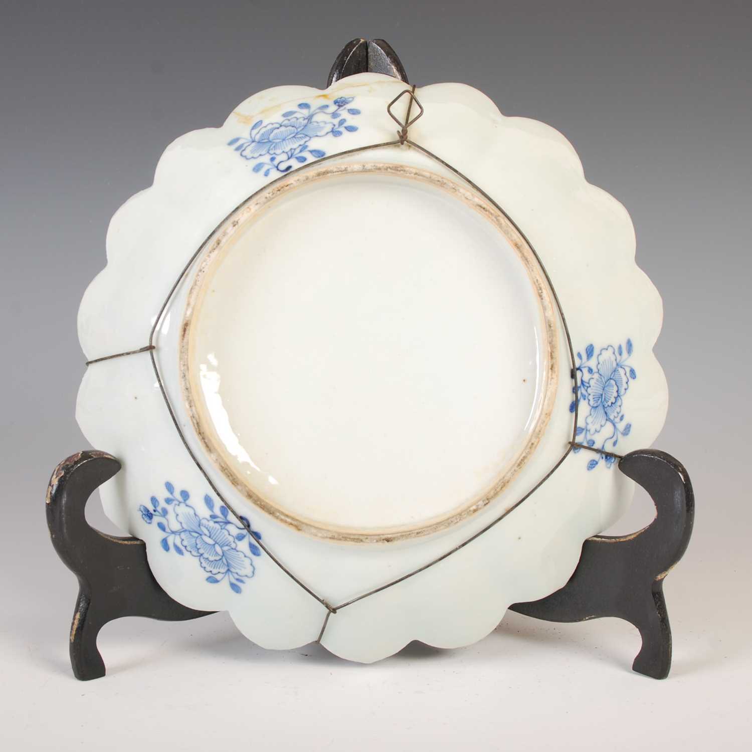 A Chinese porcelain blue and white flower shaped dish, Qing Dynasty, decorated with pavilions in a - Image 3 of 4