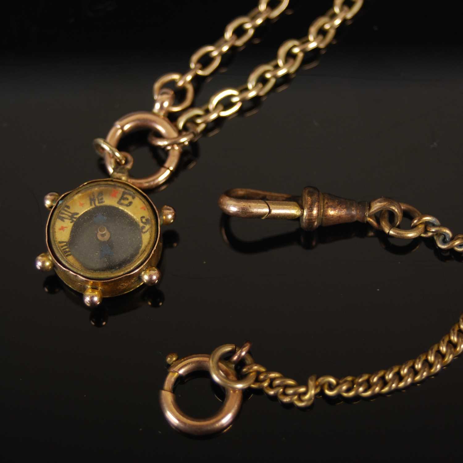 A yellow metal necklace suspending compass pendant, gross weight 10 grams, together with a yellow - Image 2 of 3