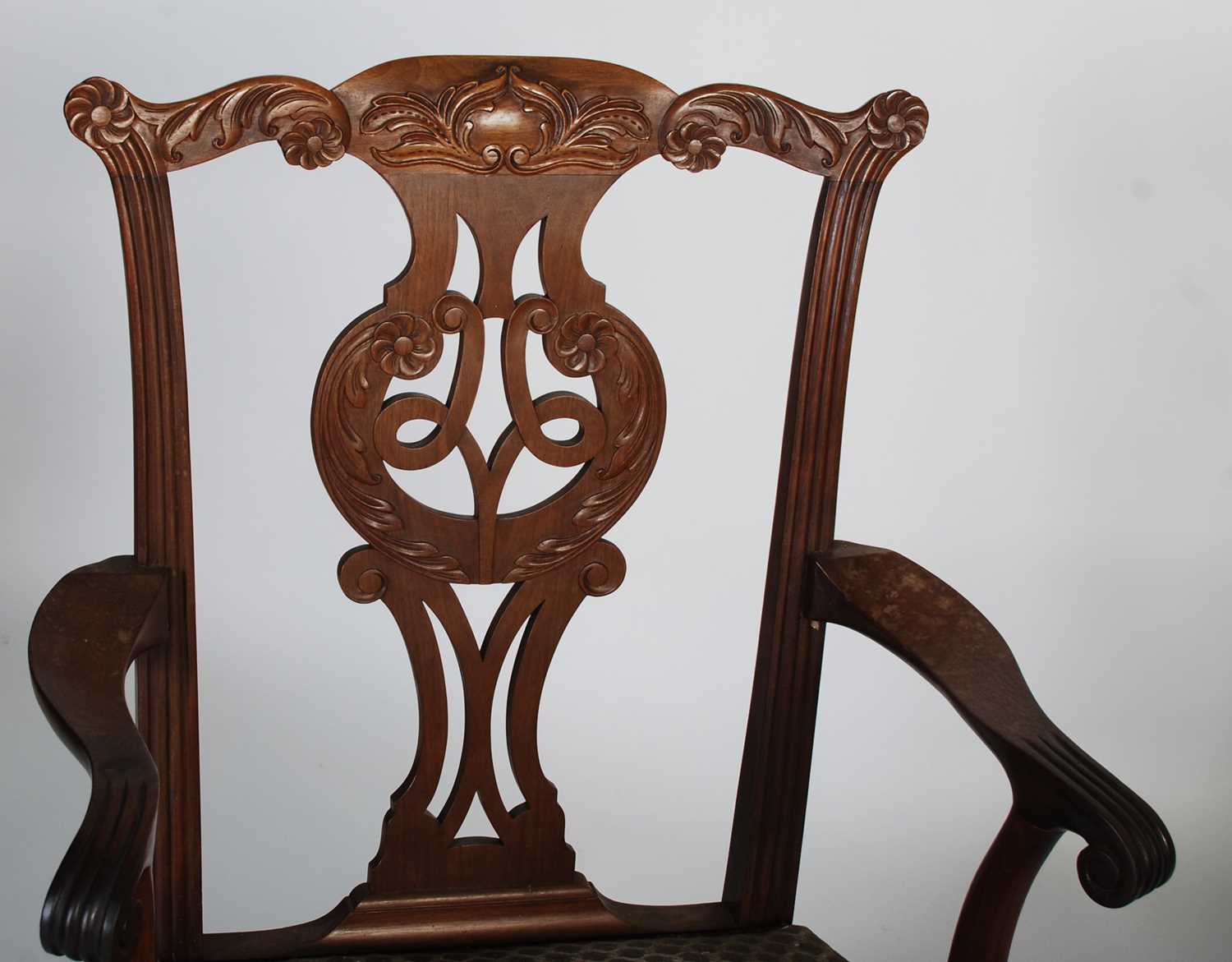 A pair of George III style mahogany elbow chairs, 20th century, the flower and scroll carved top - Image 2 of 6
