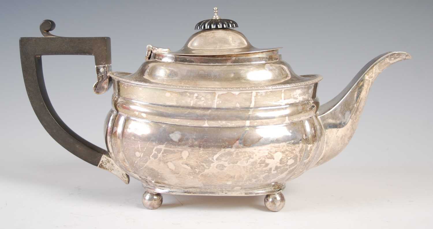 A George V silver three-piece tea set, London, 1926, makers mark of W&S, oval shaped with fluted - Image 3 of 10